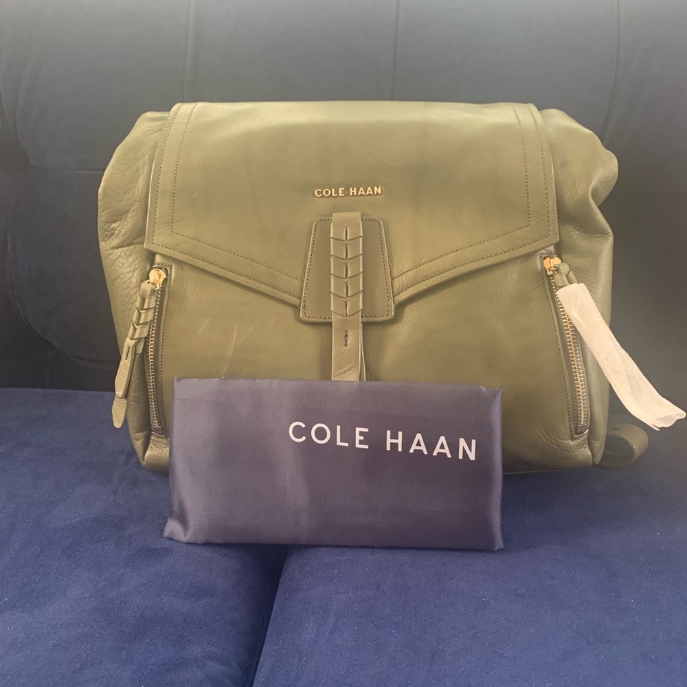 Olive green Cole Haan stylish backpack.
